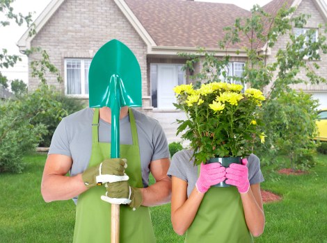 Garden maintenance crew using eco-friendly equipment